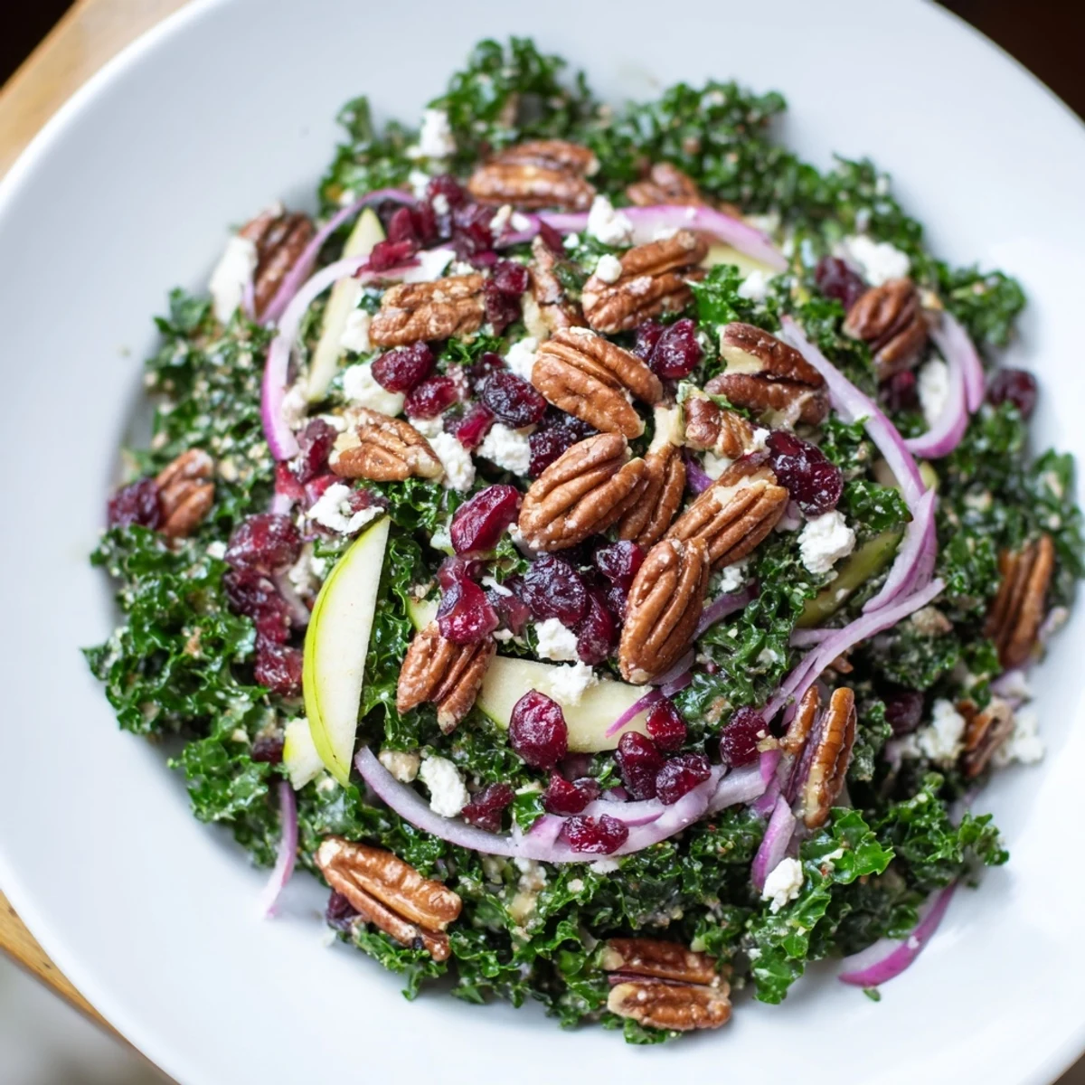 Freshly toasted pecans and chewy cranberries mingle in a vibrant Winter Kale Salad with Pecans and Cranberries, dressed in a tangy maple vinaigrette.
