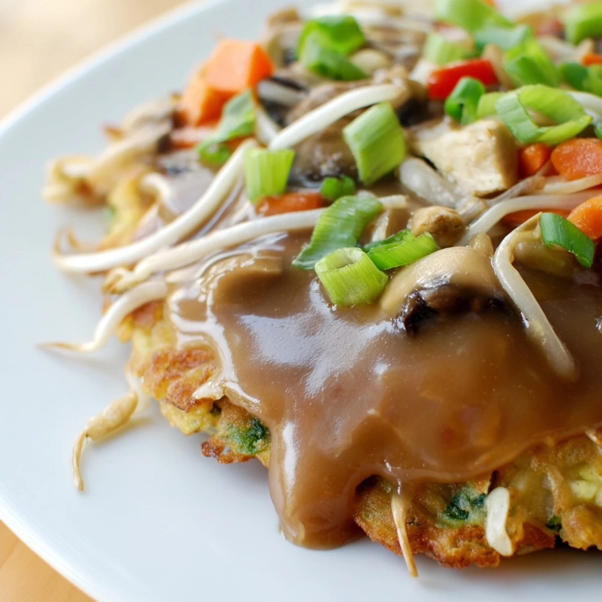 Vegetable-packed Egg Foo Young omelets fried to golden perfection with protein