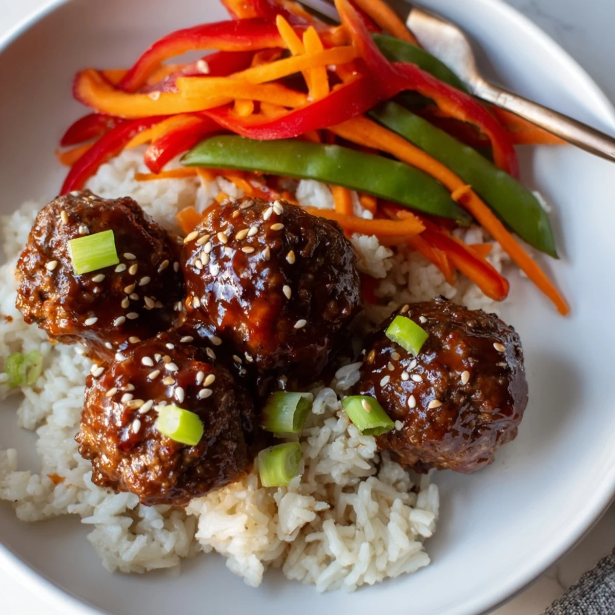 Family-style Hello Fresh Firecracker Meatballs tossed in fiery-sweet sauce, perfect weeknight dinner