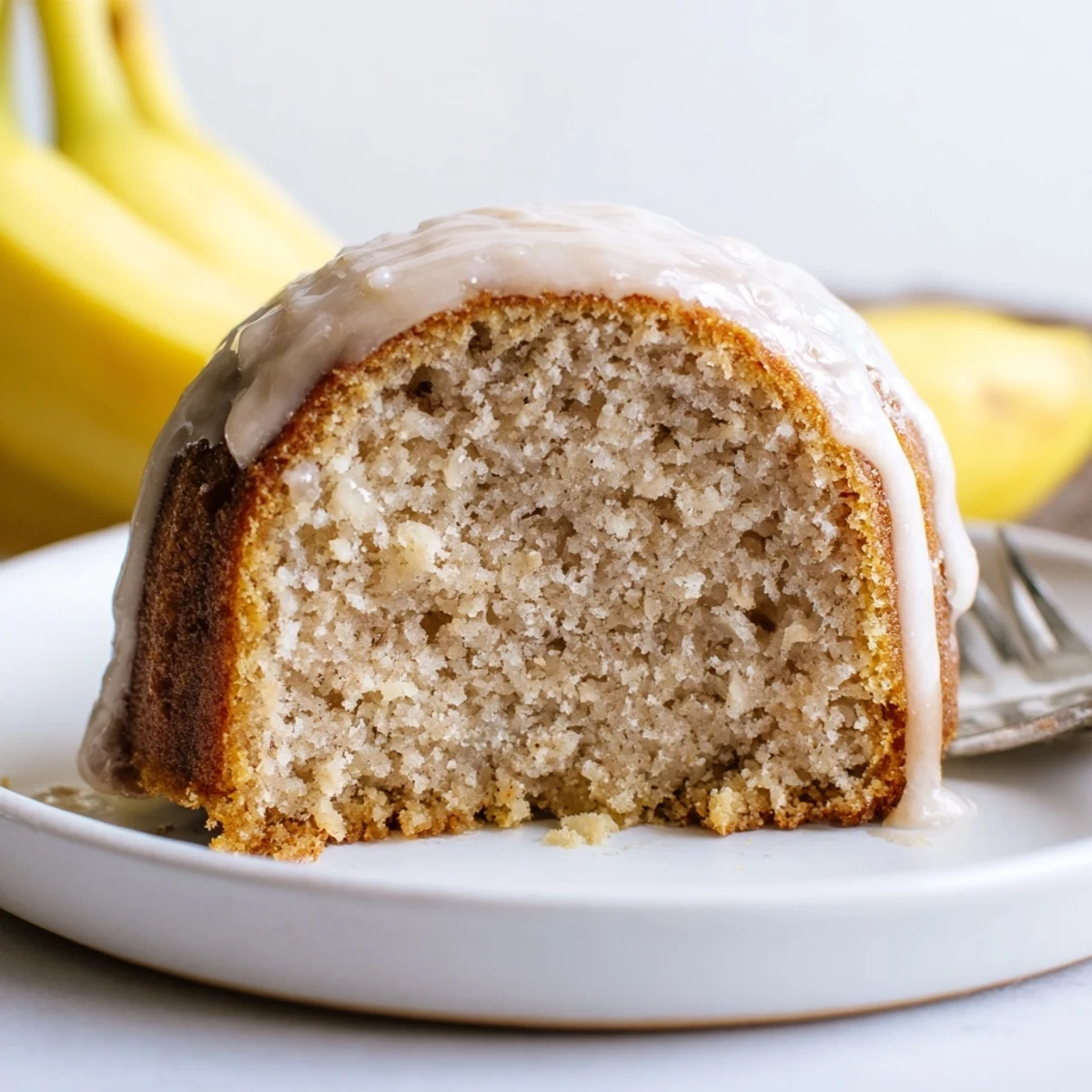 Banana Donuts cooling on a wire rack, golden, tender, sweet fruity aroma